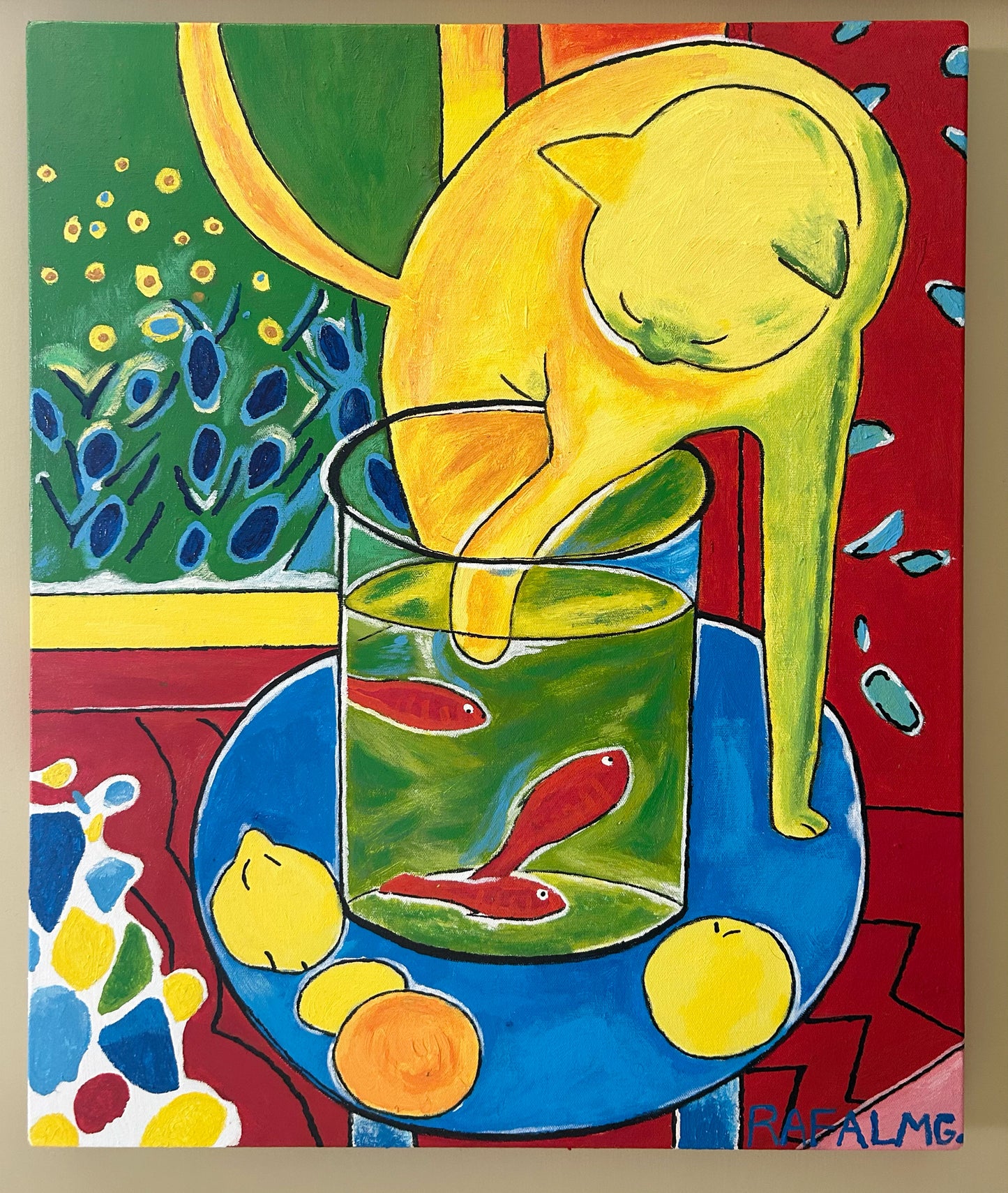 El gato con peces rojos